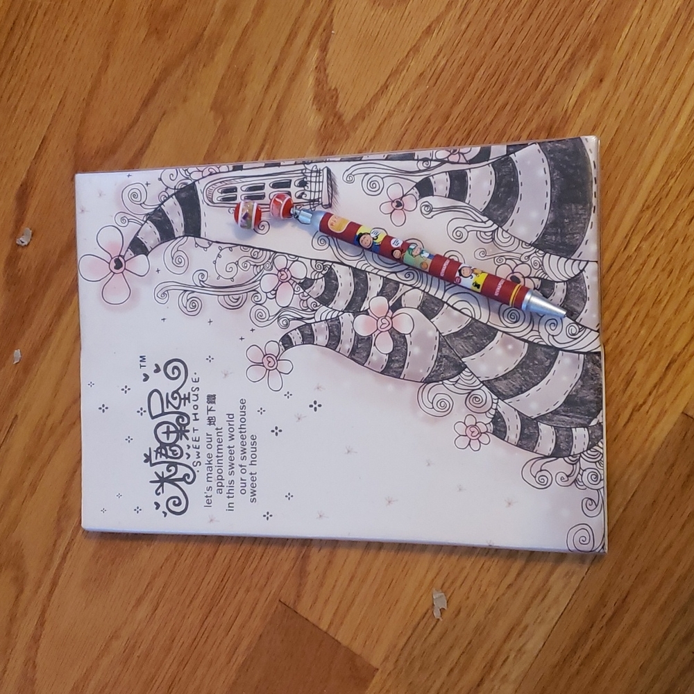 Very cute notebook with pen, new never used